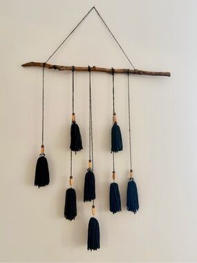 Black Tassle Boho Chic Wall Hanging on Wood